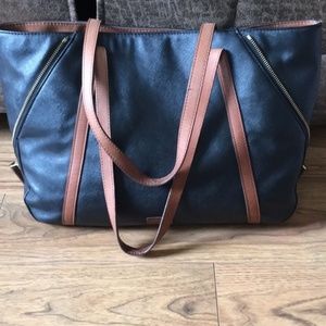 Fossil black tote with brown straps